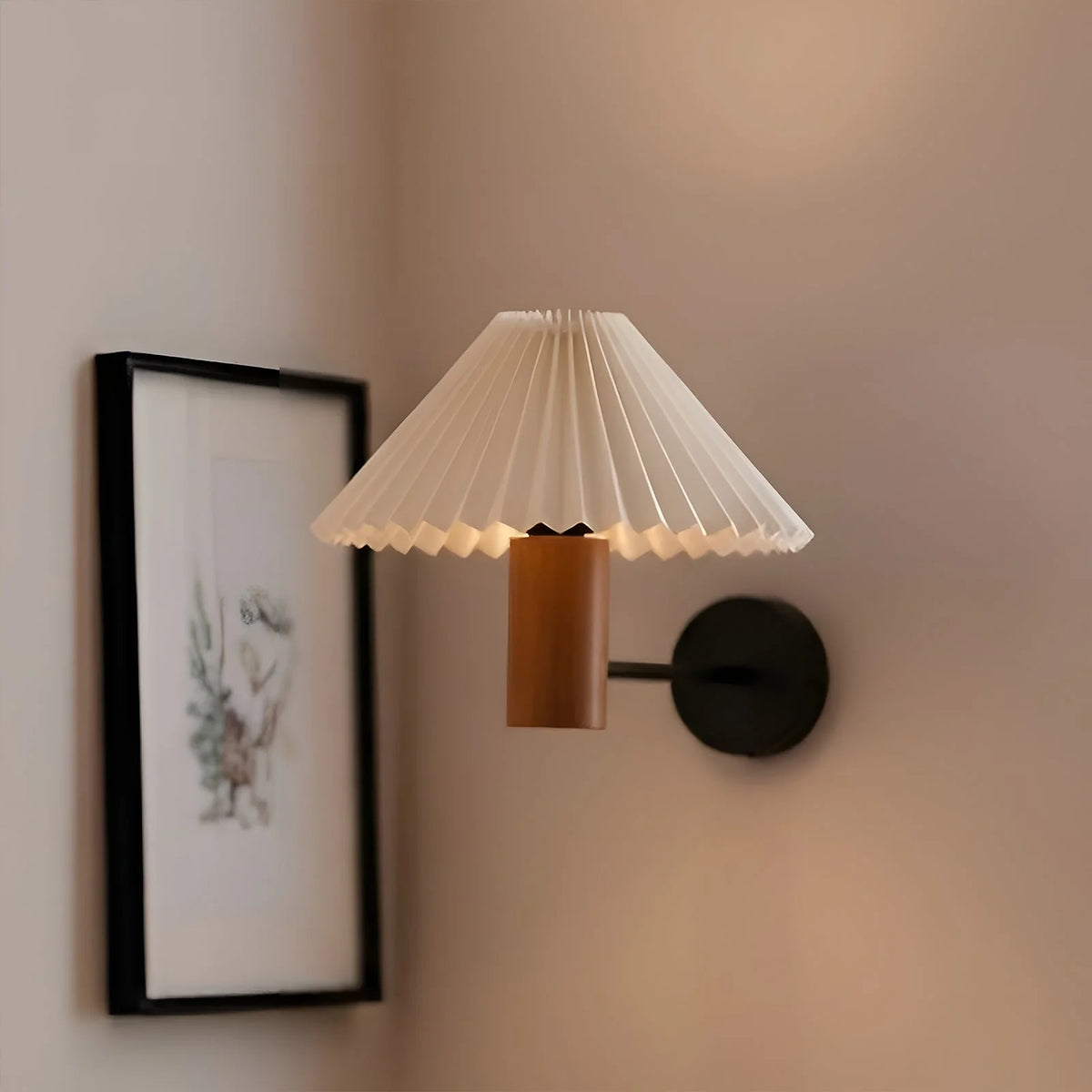 Cream pleated wall sconce with wooden base and black round wall mount