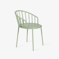 Close-up of textured green tabletop and metal table leg