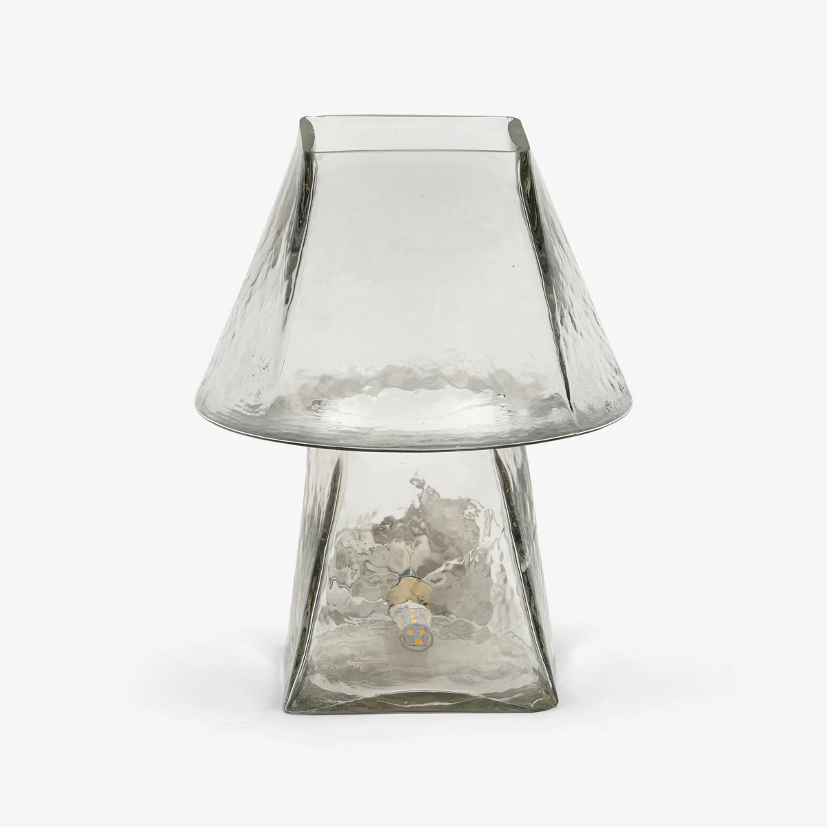 Clear glass table lamp with transparent trapezoid shade and glass base