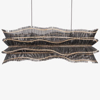 Large black rattan-style hanging chandelier with sculptural layered shades