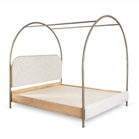 Front angled view of modern four-poster canopy bed with arched metal frame and wooden platform