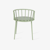 Close-up of round green outdoor table surface and curved edge