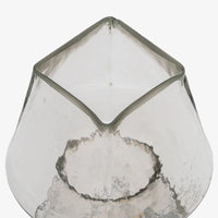 Top view of clear glass table lamp with transparent shade and glass base