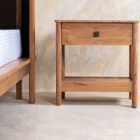 Wooden bedside table with single drawer and open shelf in natural wood finish