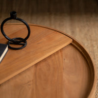 Close-up of natural wood grain on round wooden coffee table tabletop