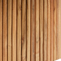 Close-up of round wooden coffee table fluted base with vertical slatted detailing and warm wood finish.