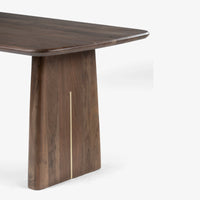 Side angle of modern walnut wooden dining table with sturdy legs