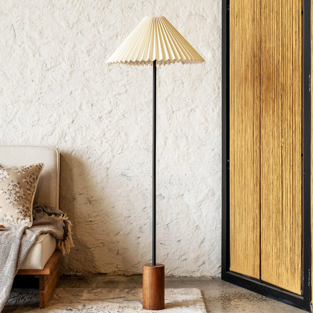 Modern cream pleated floor lamp with wooden base and black metal stand