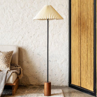 Modern cream pleated floor lamp with wooden base and black metal stand