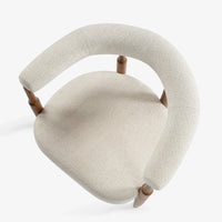 Unique curved backrest design of cream upholstered wooden armchair
