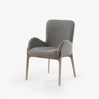 Grey upholstered armchair with wooden legs front three-quarter view