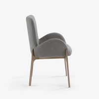 Side view of grey upholstered dining chair with wooden frame