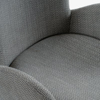 Close-up of grey fabric upholstery on a modern dining chair
