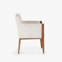 Side view of modern cream dining chair with wooden frame