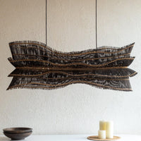 Sculptural black woven hanging light in a contemporary interior
