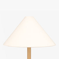 Minimalist table lamp with cream shade and wooden lamp stem