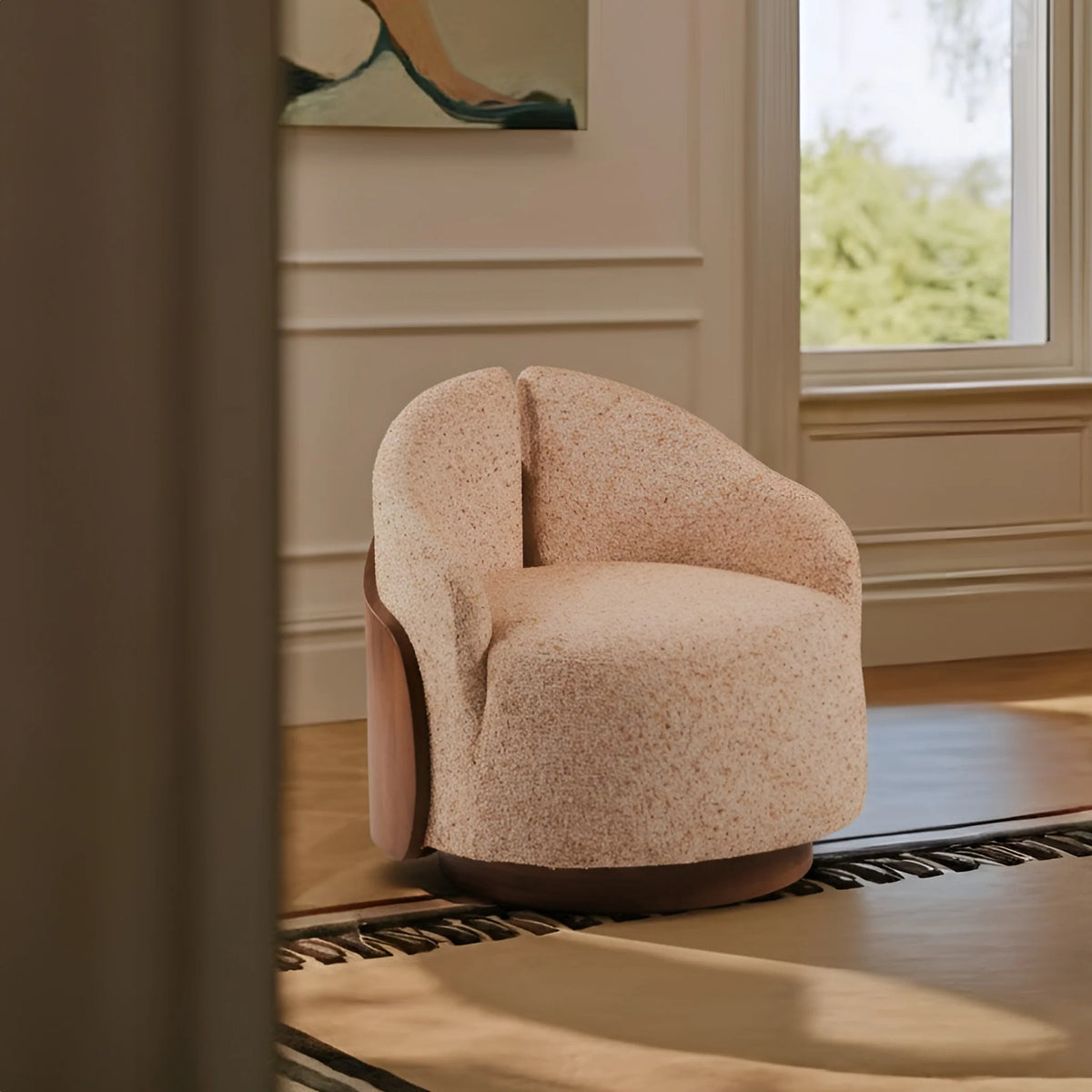 Modern beige upholstered accent chair in a luxury living room